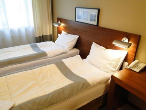 Hotel Atrium Elblag Oda fotoğraf